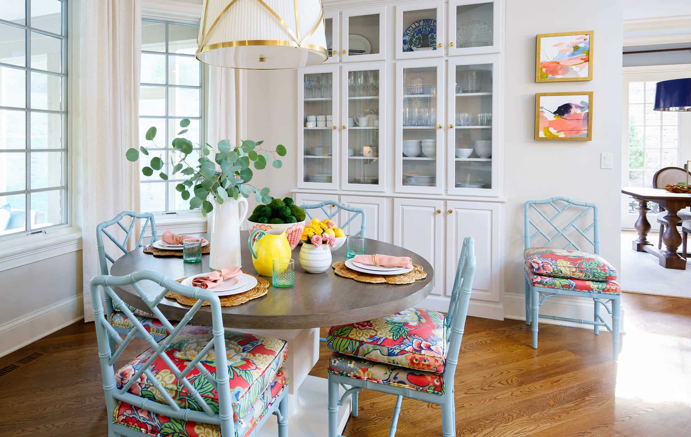 Laney Reusch Interior Design - Cincinnati Interior Designer - Furniture and Decor Design - White Dining room with blue and pink